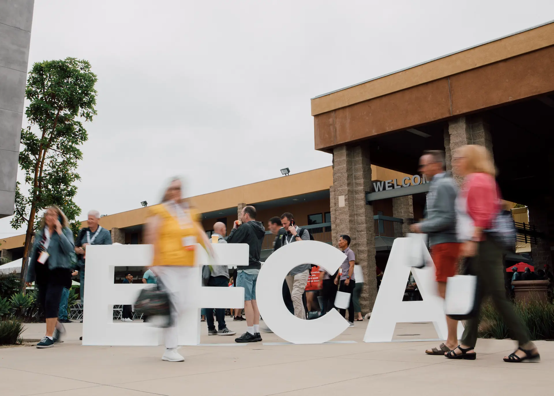 People walking outside a church building.